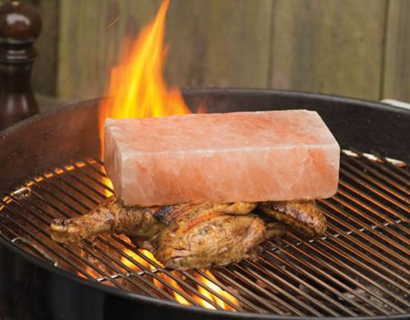 Chicken grilled beneath Himalayan Salt Brick